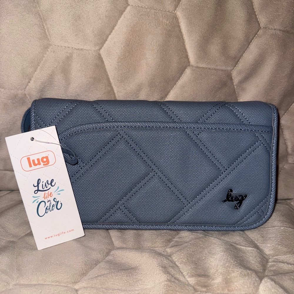 NWT Tango matte luxe vegan leather passport wallet. Dust bag included. Blue Moon